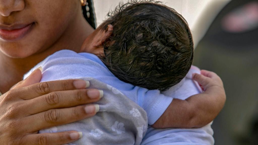 Latina mother and newborn
